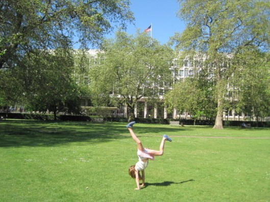 Meg doing a cartwheel after we put in for her new US passport
